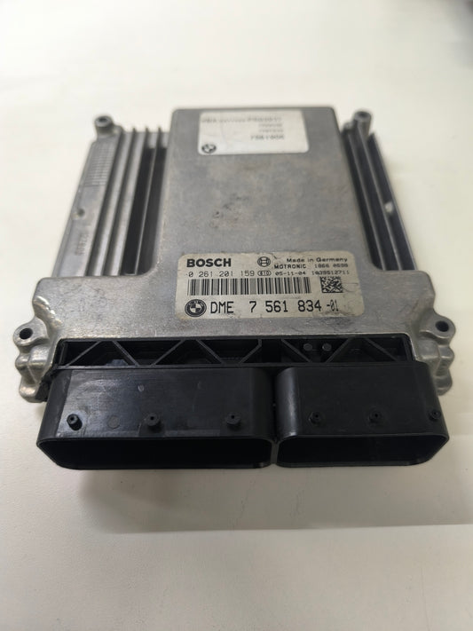 7 561 834-01   DME ENGINE CONTROL MODULE  BMW 320